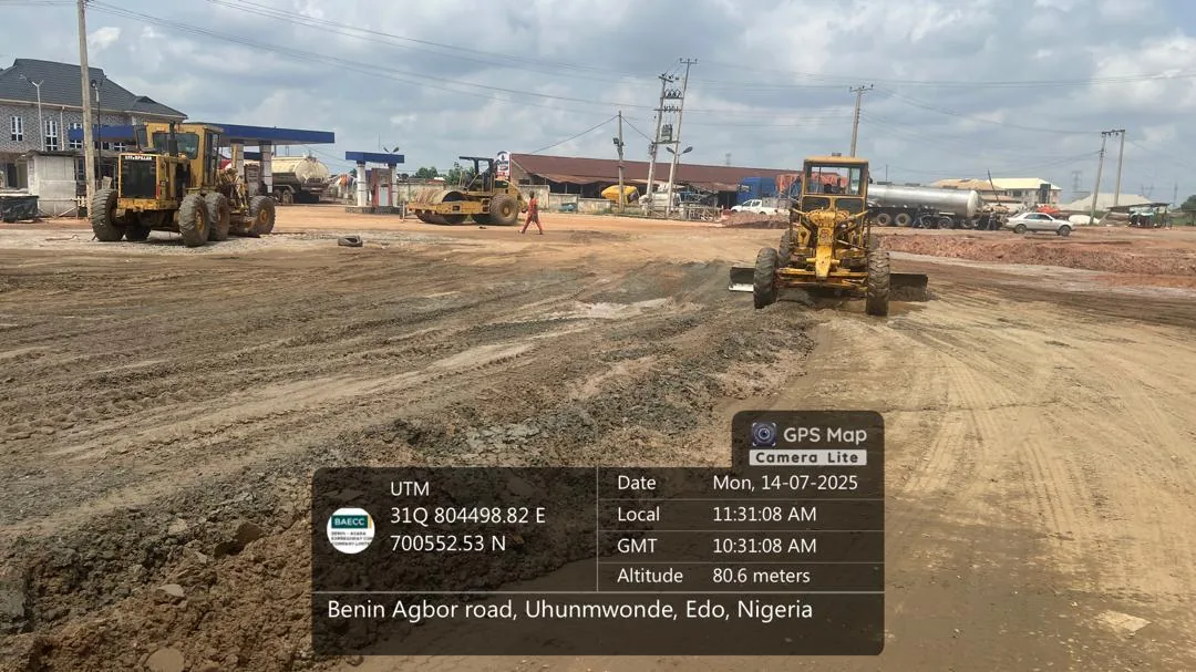 A grader and roller working the road formation on the Benin-Agbor road at Uhunmwonde, Edo State.